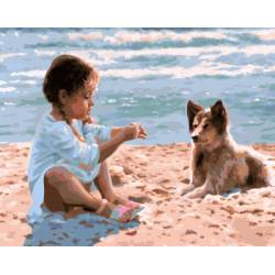 Дівчинка з собакою на пляжі