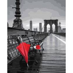 Красный зонт на мосту