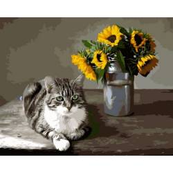 Котик і букет соняшників
